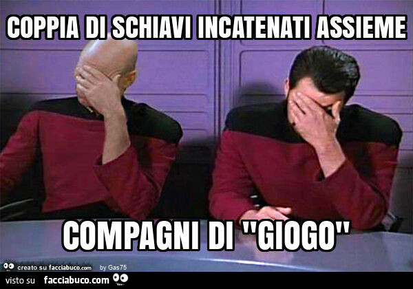 Coppia di schiavi incatenati assieme compagni di "giogo"